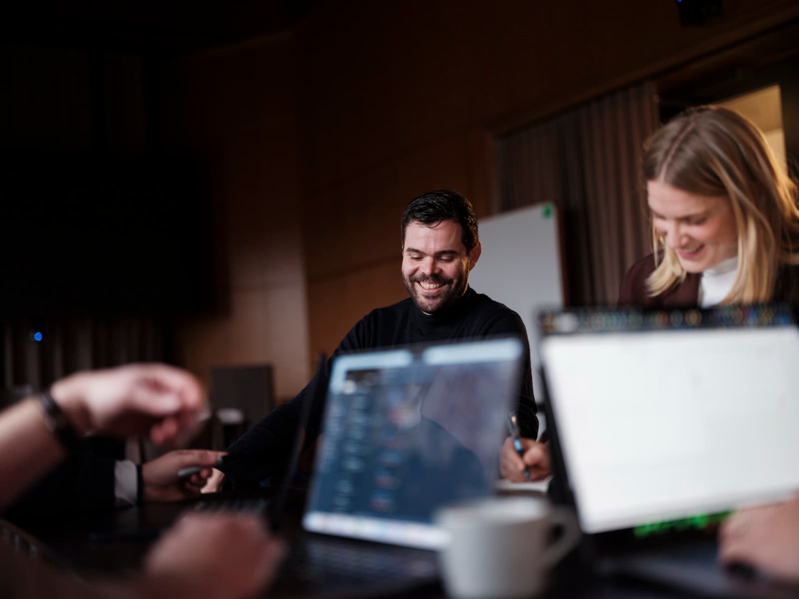 Curamando team in a working session